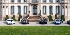 bugattis in front of mansion