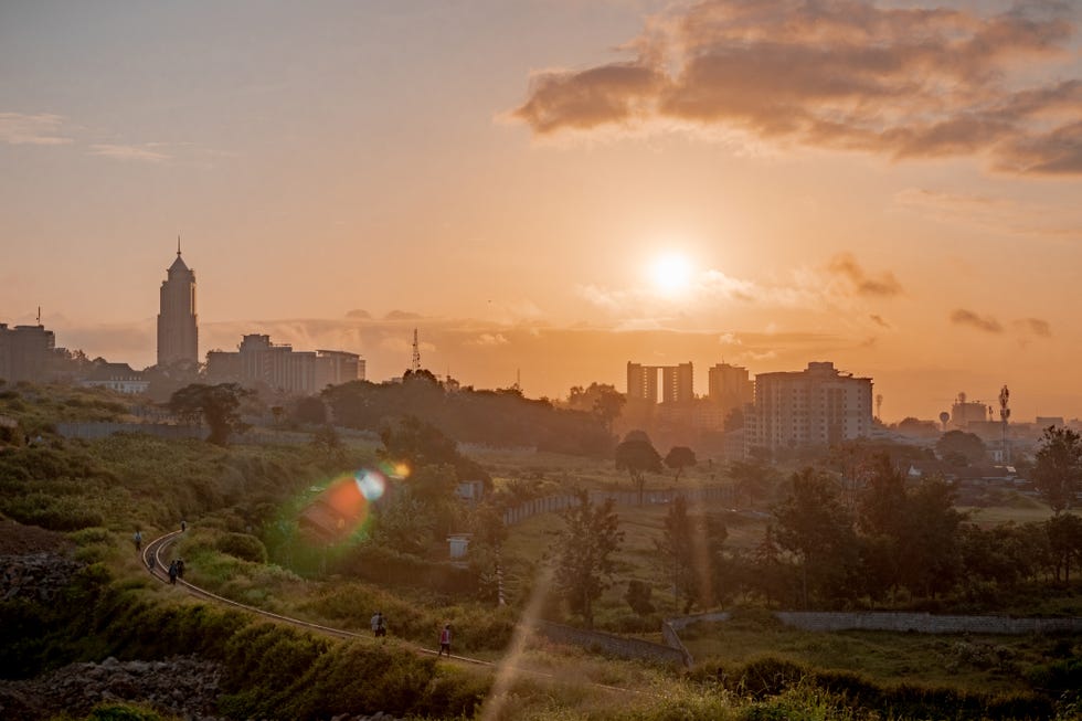 buildings in city during sunset