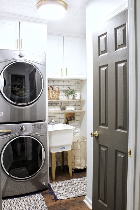 built in stacked washer dryer laundry room