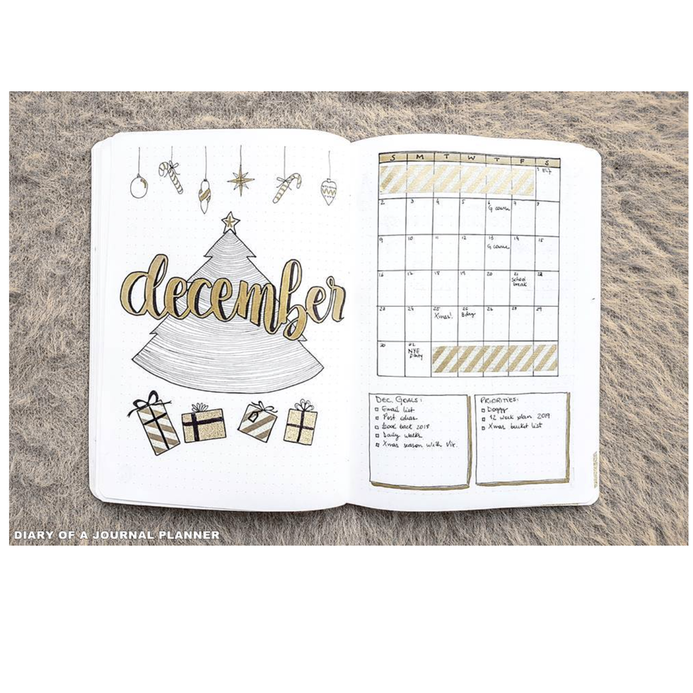 a december monthly spread by diary of a journal planner