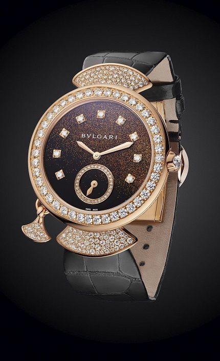 Analog watch, Watch, Watch accessory, Fashion accessory, Diamond, Jewellery, Material property, Font, Brand, Strap, 