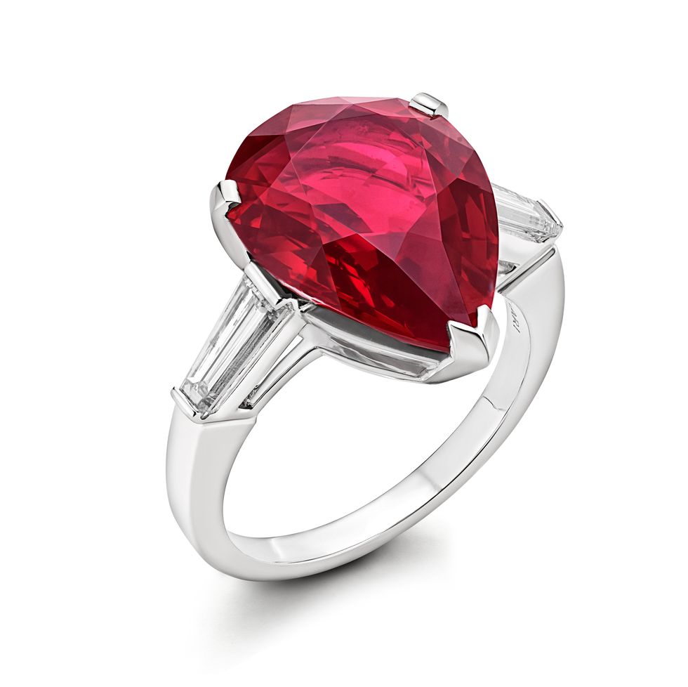 a ring with a red gem