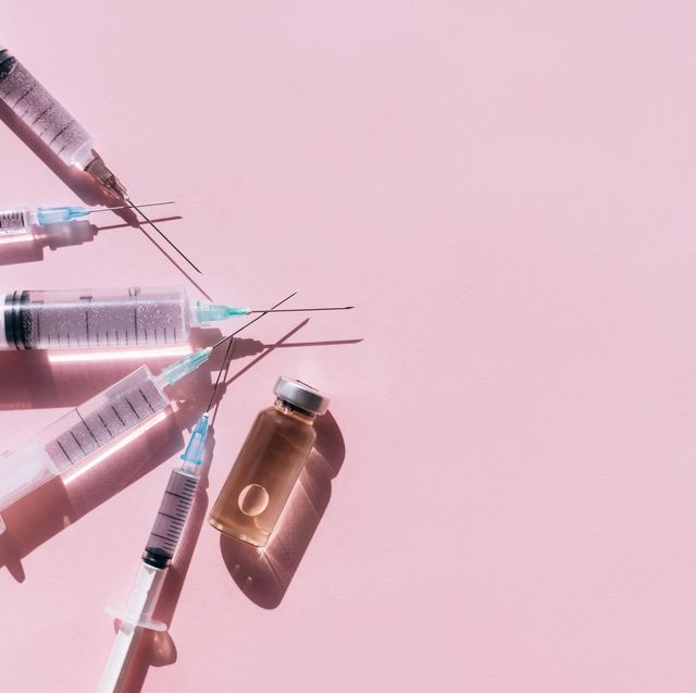 bunch of syringes near vial of drug vaccination is the most anticipated procedure of the year