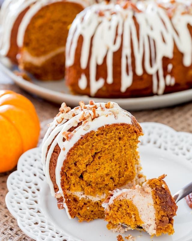 pumpkin bundt cake with cream cheese filling slice on plate