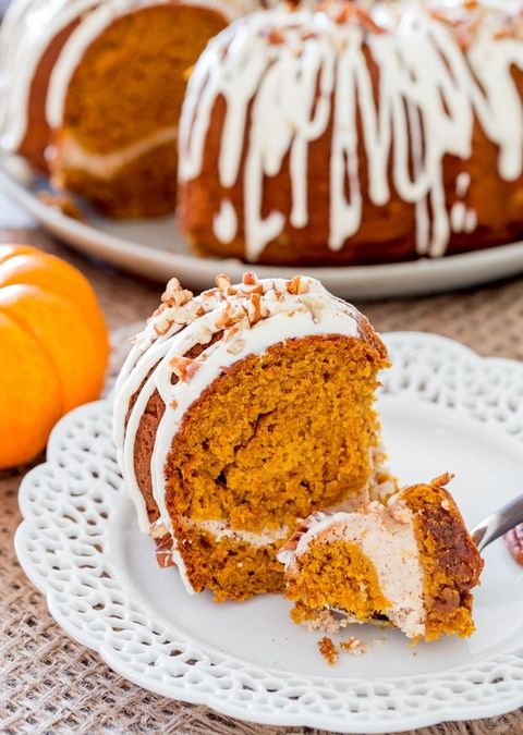 pumpkin bundt cake with cream cheese filling slice on plate