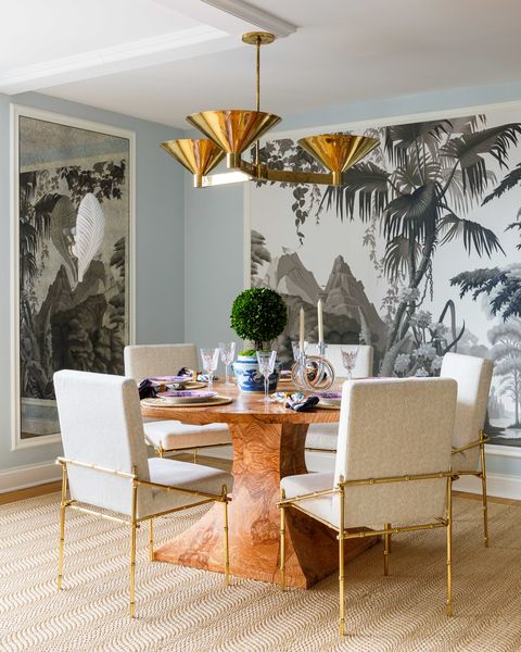 dining room, white and gold dining chairs, wooden circle dining table, gold ceiling pendant, wall mirror