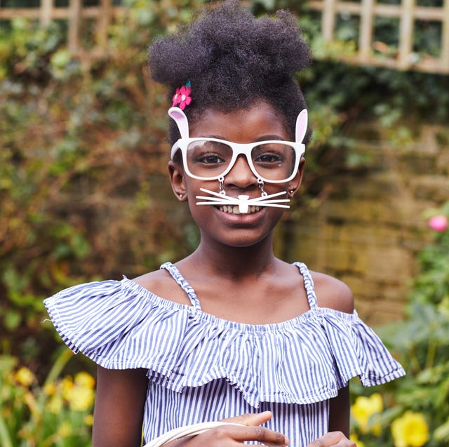 child wearing easter bunny glasses in the sun