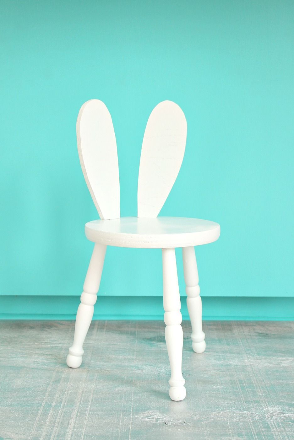 stool with rabbit ears on the back