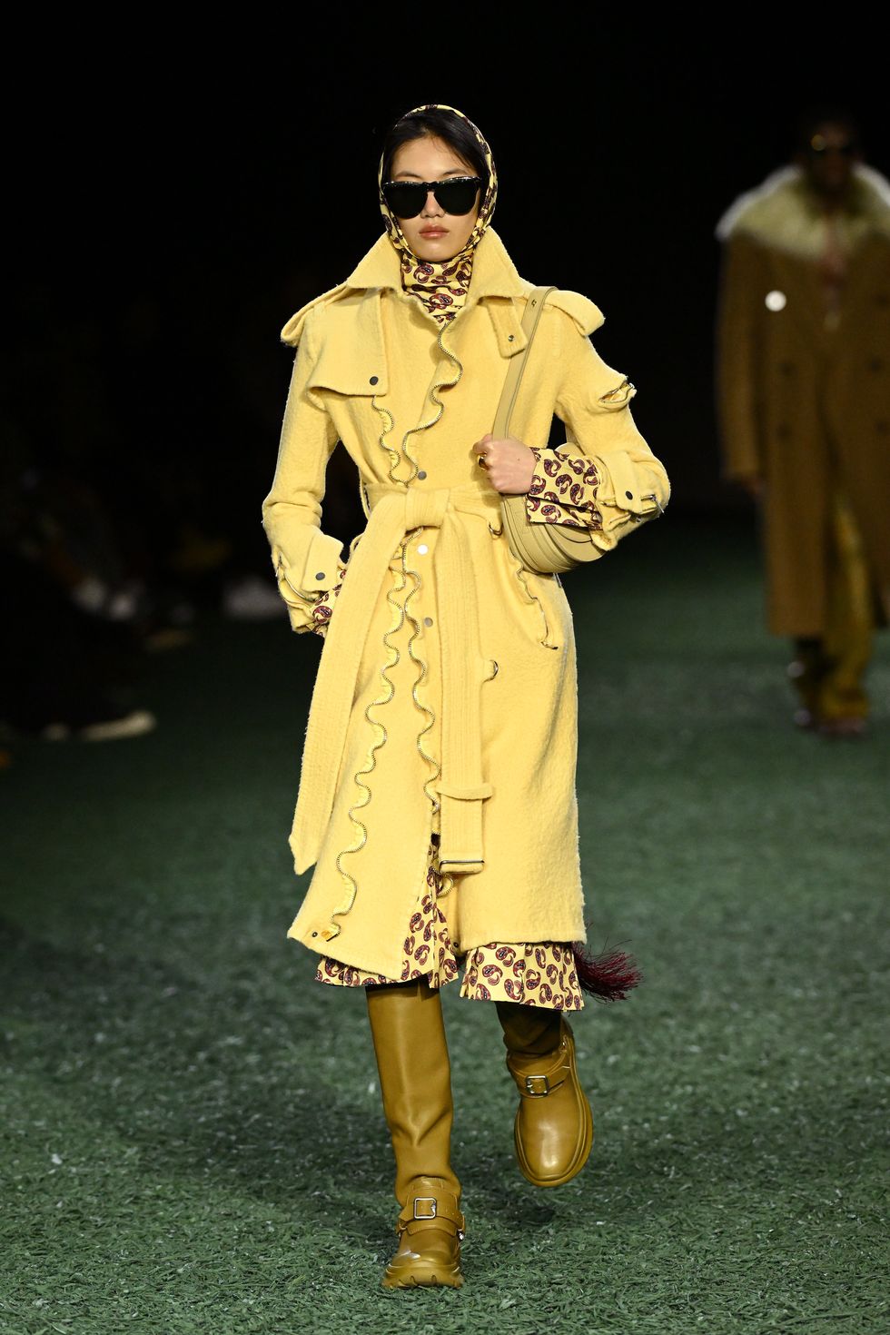 a model walks the runway at the burberry show during london fashion wee