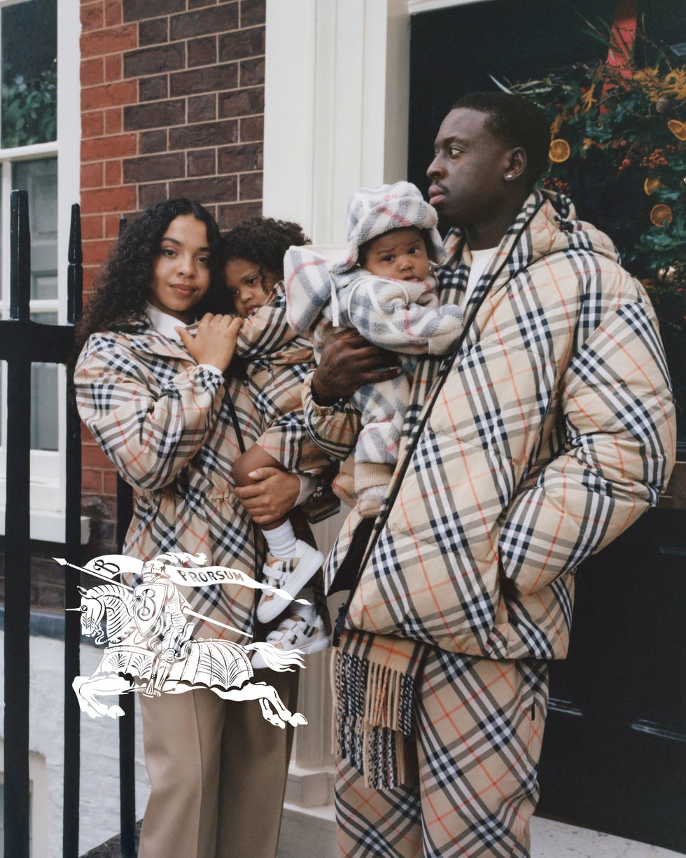 family portrait featuring slawn, who appears with his partner tallula christie in matching burberry checks