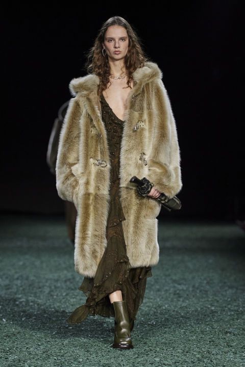 a person in a fur coat