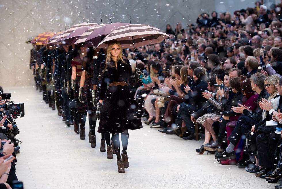 london, england february 20 cara delevingne and models walk the runway during the burberry prorsum show at london fashion week autumnwinter 2012 at kensington gardens on february 20, 2012 in london, england photo by ian gavangetty images