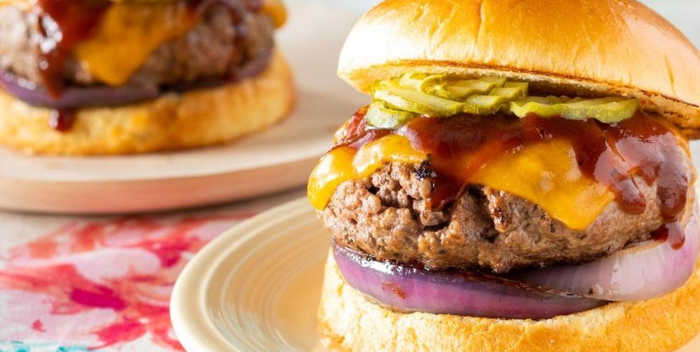 burger recipes bison burger with bbq sauce pickles and onion on bun