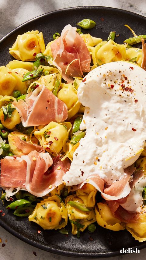 butter toasted cheese tortellini with snap peas, sweet peas, prosciutto, creamy burrata, lemon zest, and red pepper flakes