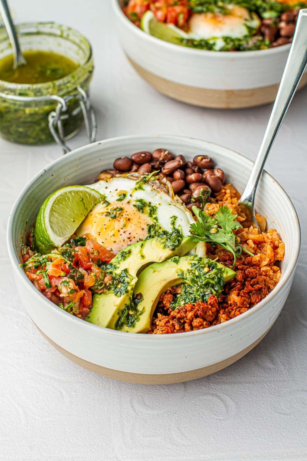 https://hips.hearstapps.com/hmg-prod/images/burrito-recipes-breakfast-burrito-bowl-1675968225.jpeg?crop=1.00xw:0.834xh;0,0.0704xh&resize=980:*