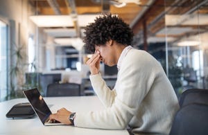 Businessman working late in office