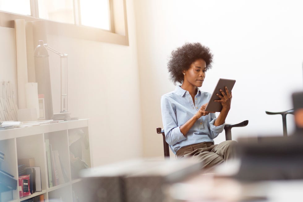 businesswoman using digital tablet