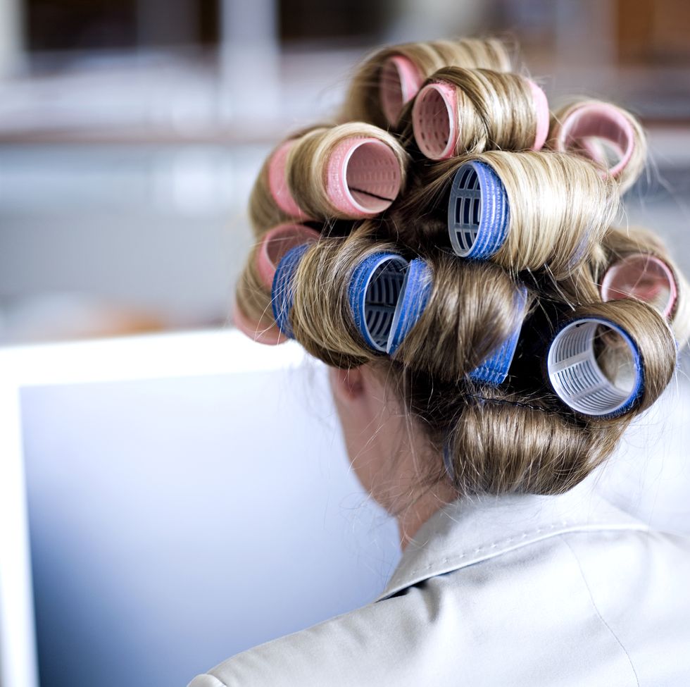 woman in curlers