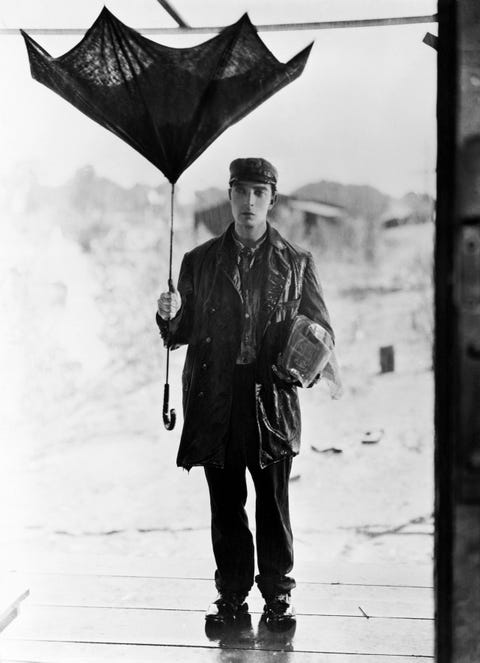 buster keaton conserving broken umbrella in steamboat bill, jr