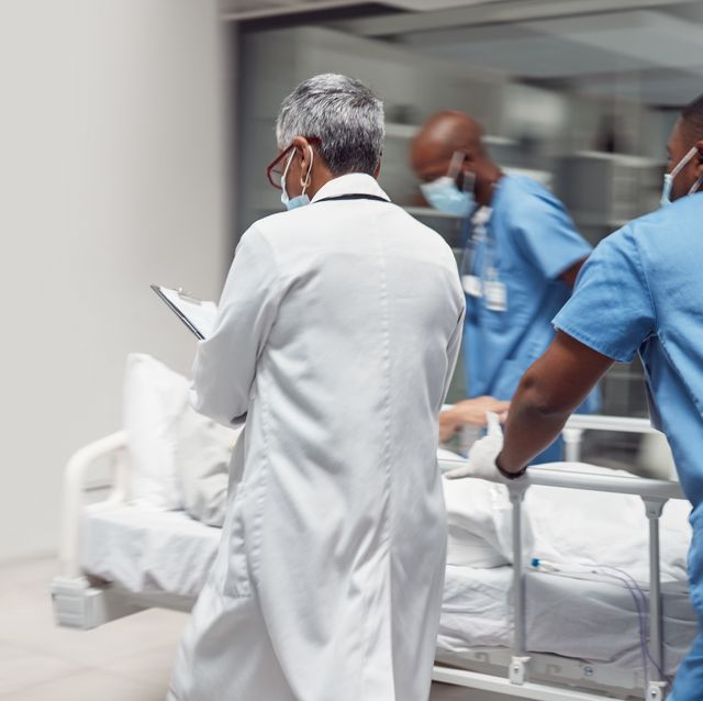 busy, healthcare and doctors rush with patient, surgery and ready for procedure in hospital. fast team, medical professional and staff with emergency, accident and health with wellness and nurses