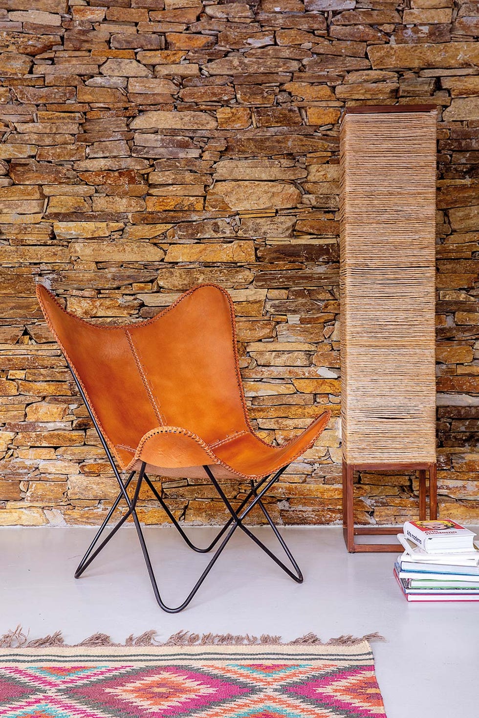 Chalé familiar en Madrid: Sillón butterfly de piel