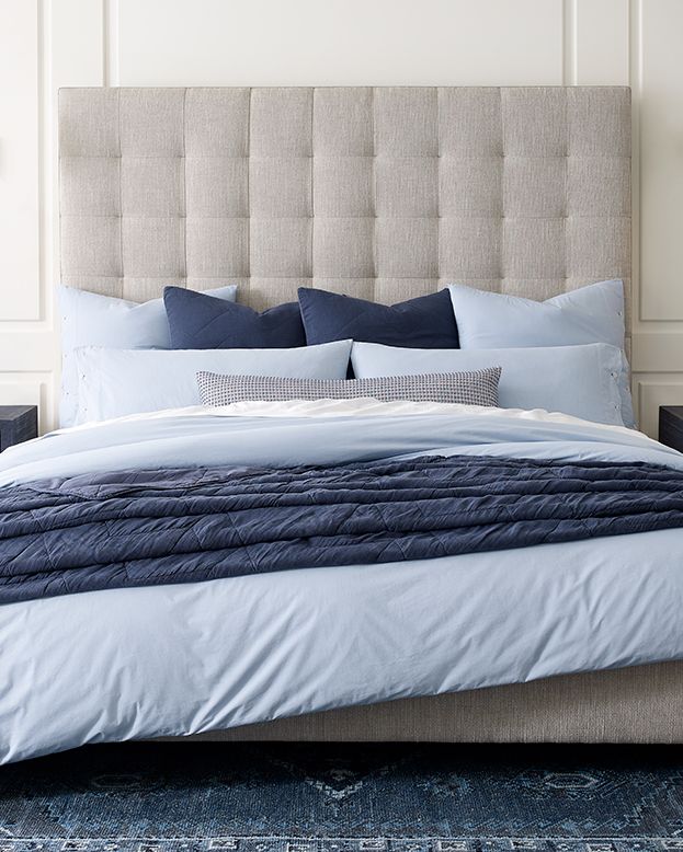 light blue, navy, and white bedding