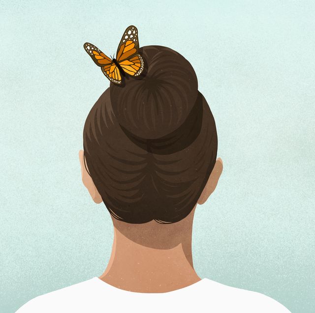butterfly in womans hair