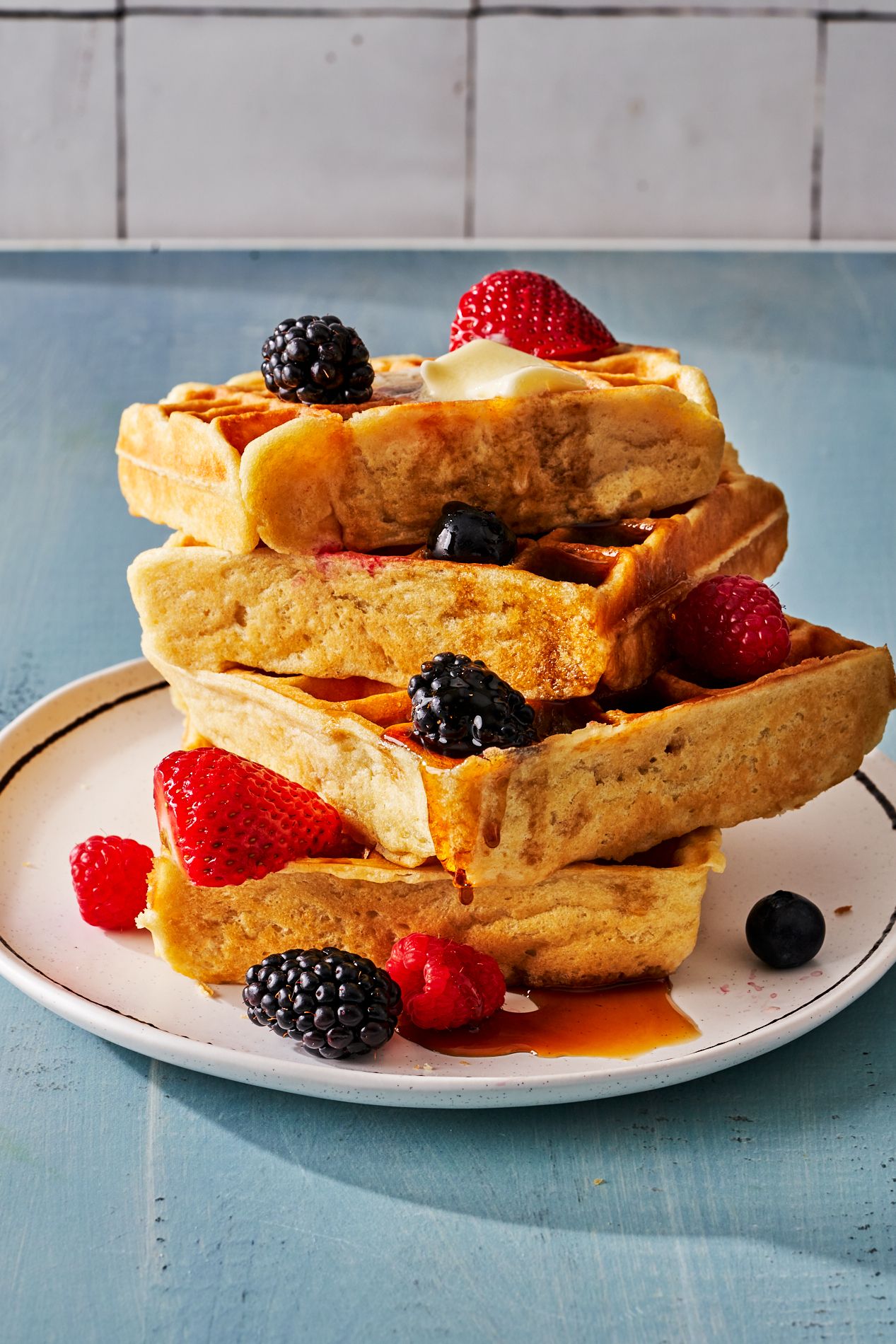 https://hips.hearstapps.com/hmg-prod/images/buttermilk-waffles3-1654190937.jpg