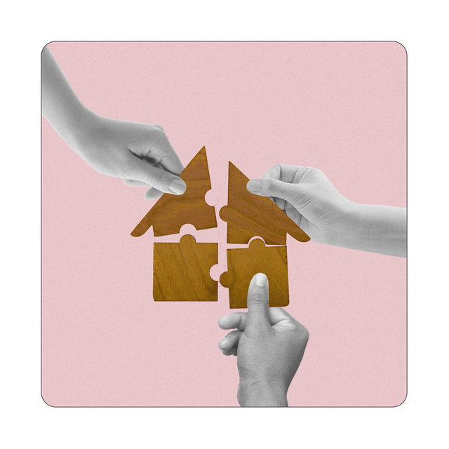 hands building a house jigsaw puzzle