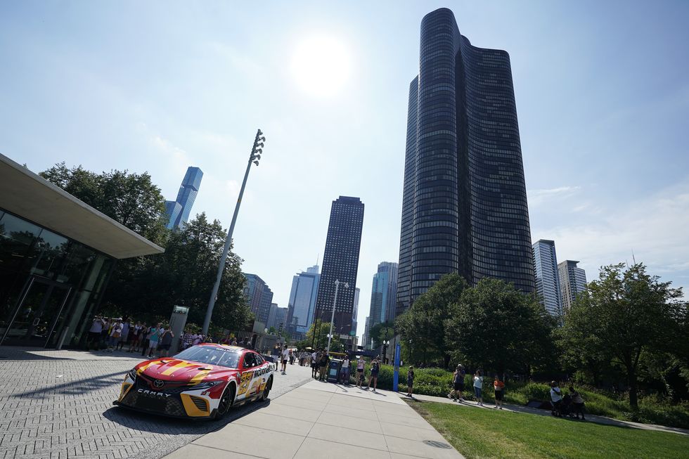 chicago, illinois july 19 bubba wallace drives at navy pier in promotion of the nascar chicago street race announcement on july 19, 2022 in chicago, illinois photo by patrick mcdermottgetty images