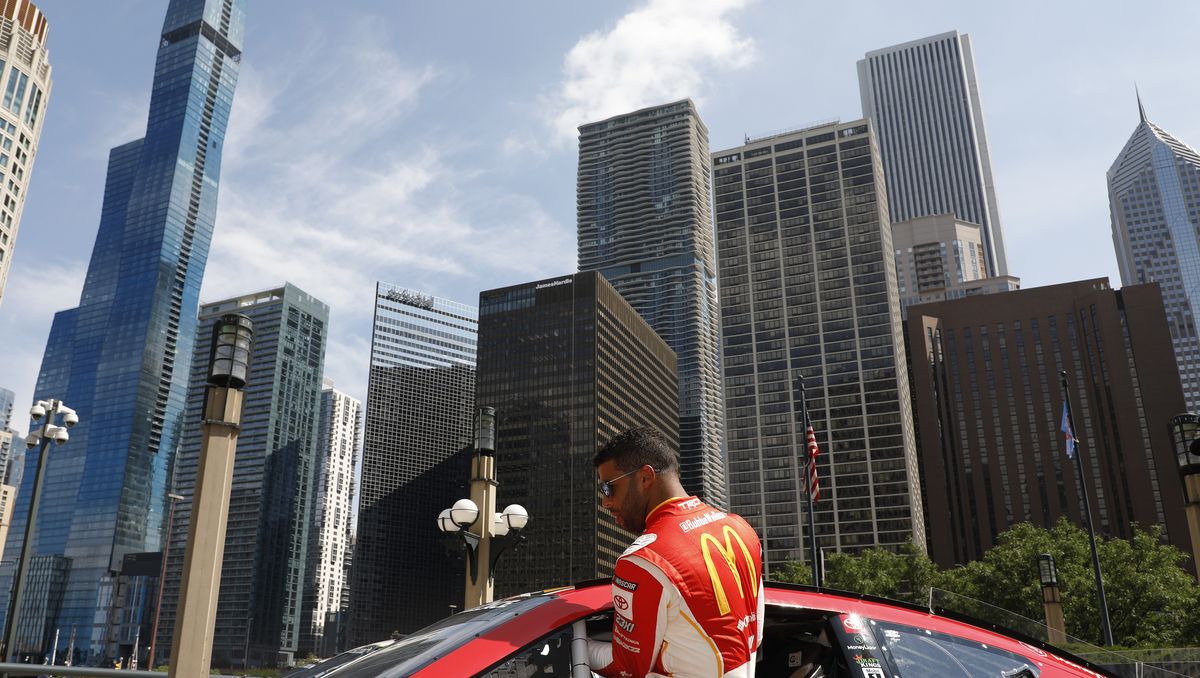 chicago, illinois july 19 bubba wallace gets into his car before driving around downtown chicago in promotion of the nascar chicago street race announcement on july 19, 2022 in chicago, illinois photo by patrick mcdermottgetty images