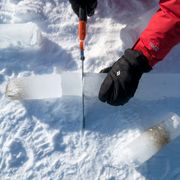 researchers study arctic ice in the form of a long, cylindrical "core"