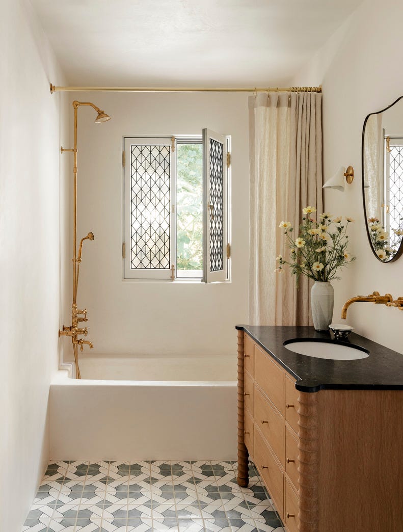 bathroom with decorative glass designed by katie hodges.