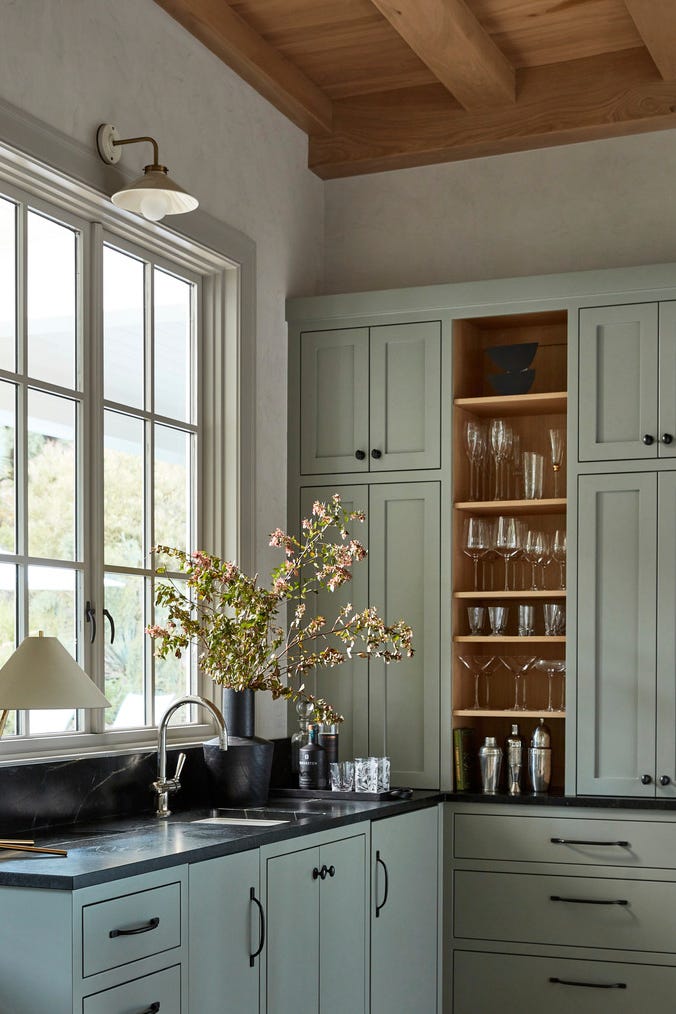lauren nelson moved her clients dedicated cocktail bar from a hallway to a corner in the great room near the kitchen to create a cohesive flow lauren nelson moved her clients dedicated cocktail bar from a hallway to a corner in the great room near the kitchen to create a cohesive flow