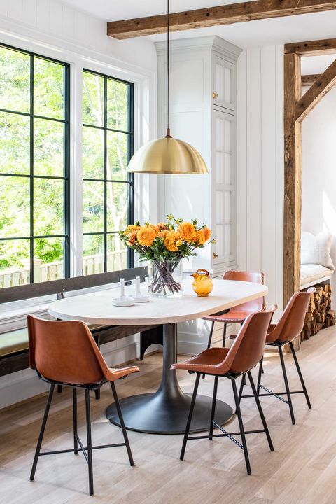 breakfast nook with brown leather chairs