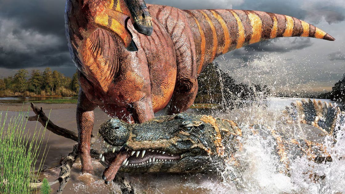 deinosuchus valt een prooi aan