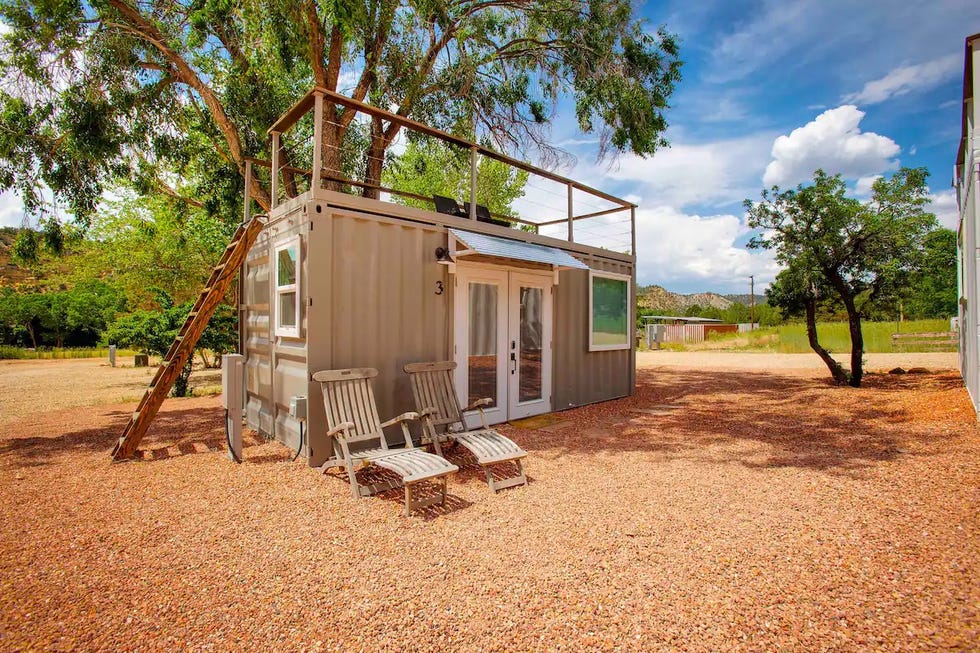 a small building with a slide