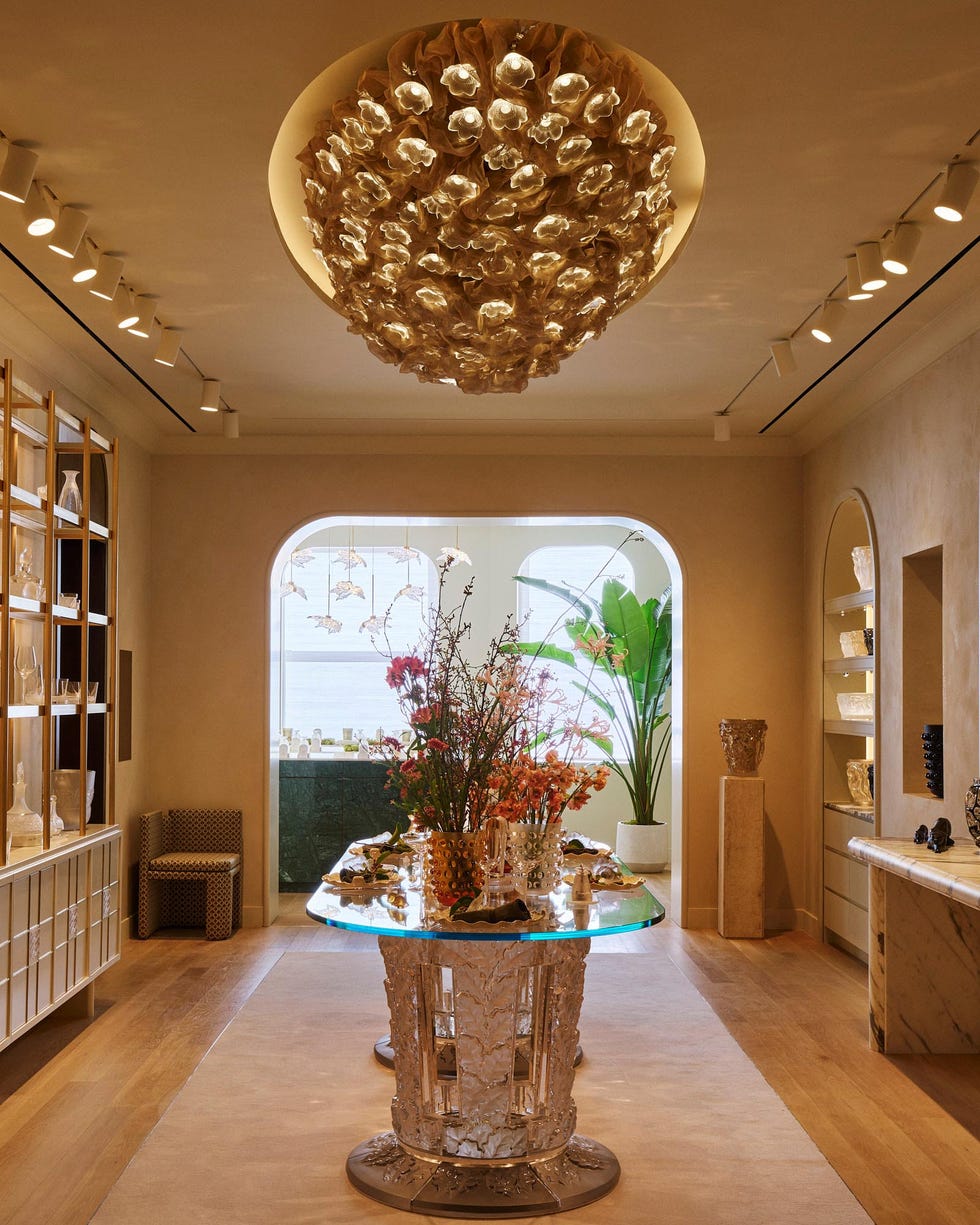 A stylish interior space showcasing decorative items and a unique table.