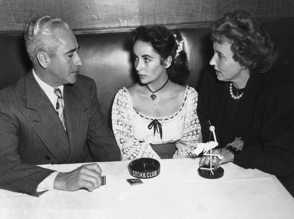 liz taylor and parents at the stork club