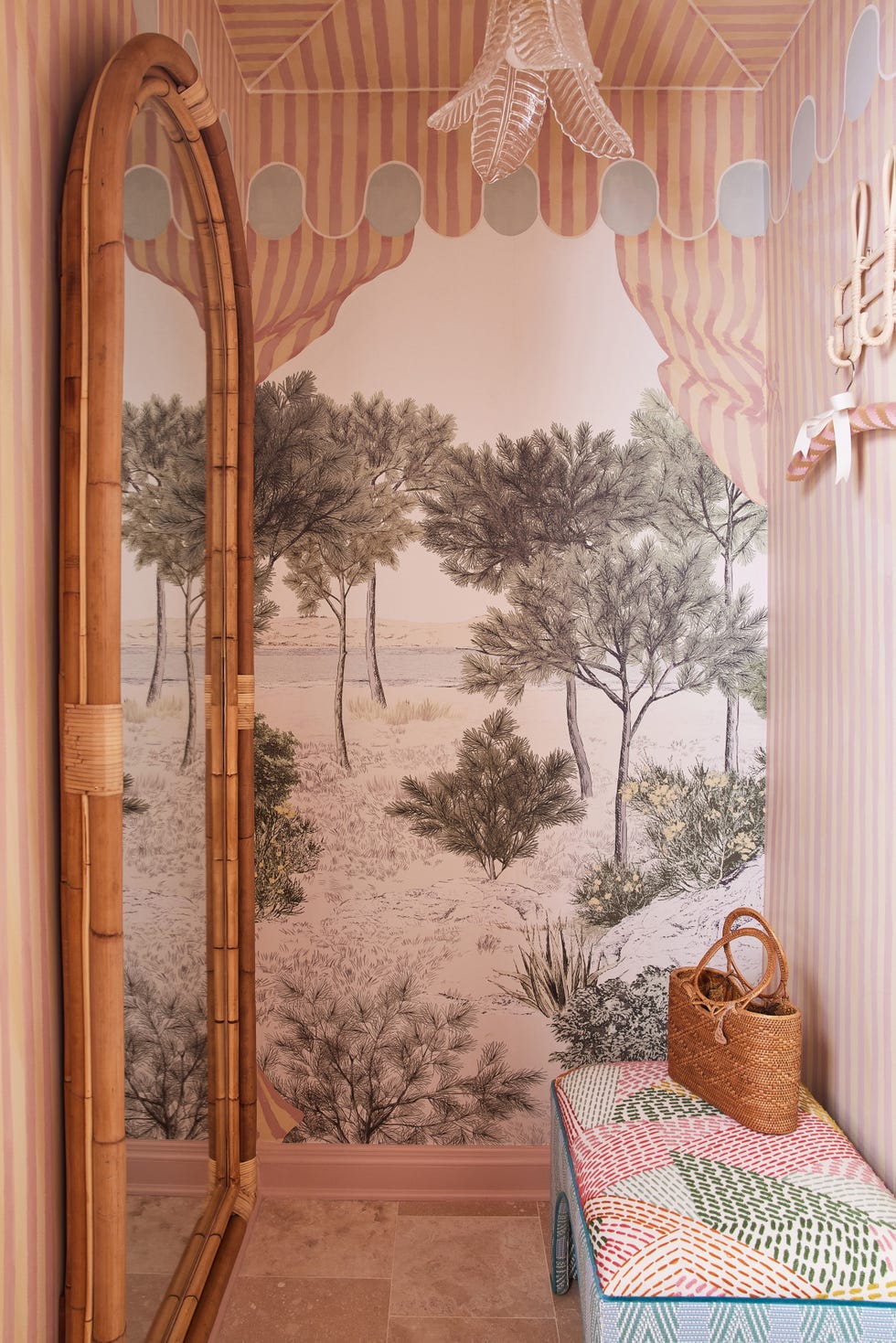 tree wallpaper and trompe l'oeil curtains in a pool dressing room