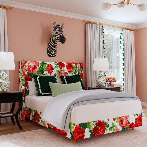 bed upholstered in roses