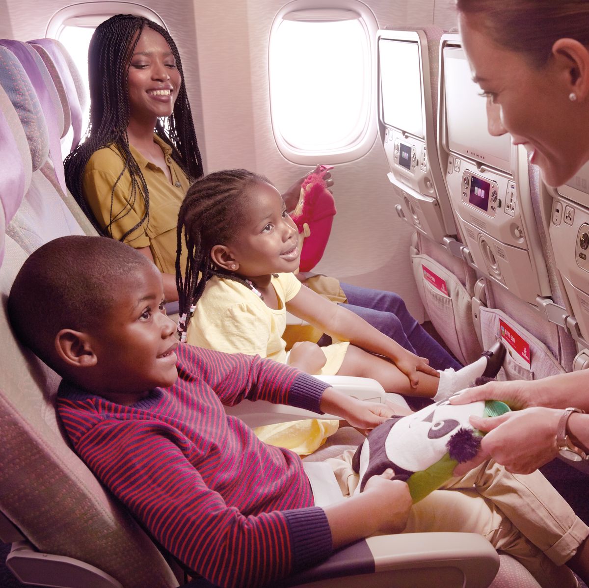 How To Survive a Long-Haul Flight With Kids, According to An