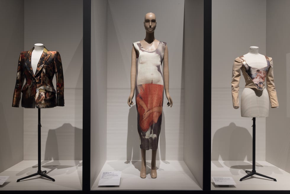 Three mannequins displaying artistic fashion garments