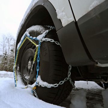 15 january 2019, bavaria, obermaiselstein a car with snow chains pulled up stands at the entrance of the closed riedberg pass photo karl josef hildenbranddpa photo by karl josef hildenbrandpicture alliance via getty images