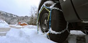 15 january 2019, bavaria, obermaiselstein a car with snow chains pulled up stands at the entrance of the closed riedberg pass photo karl josef hildenbranddpa photo by karl josef hildenbrandpicture alliance via getty images