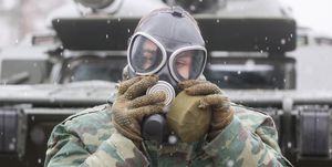 russian soldier in gas mask