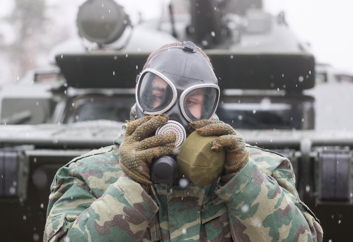 russian soldier in gas mask