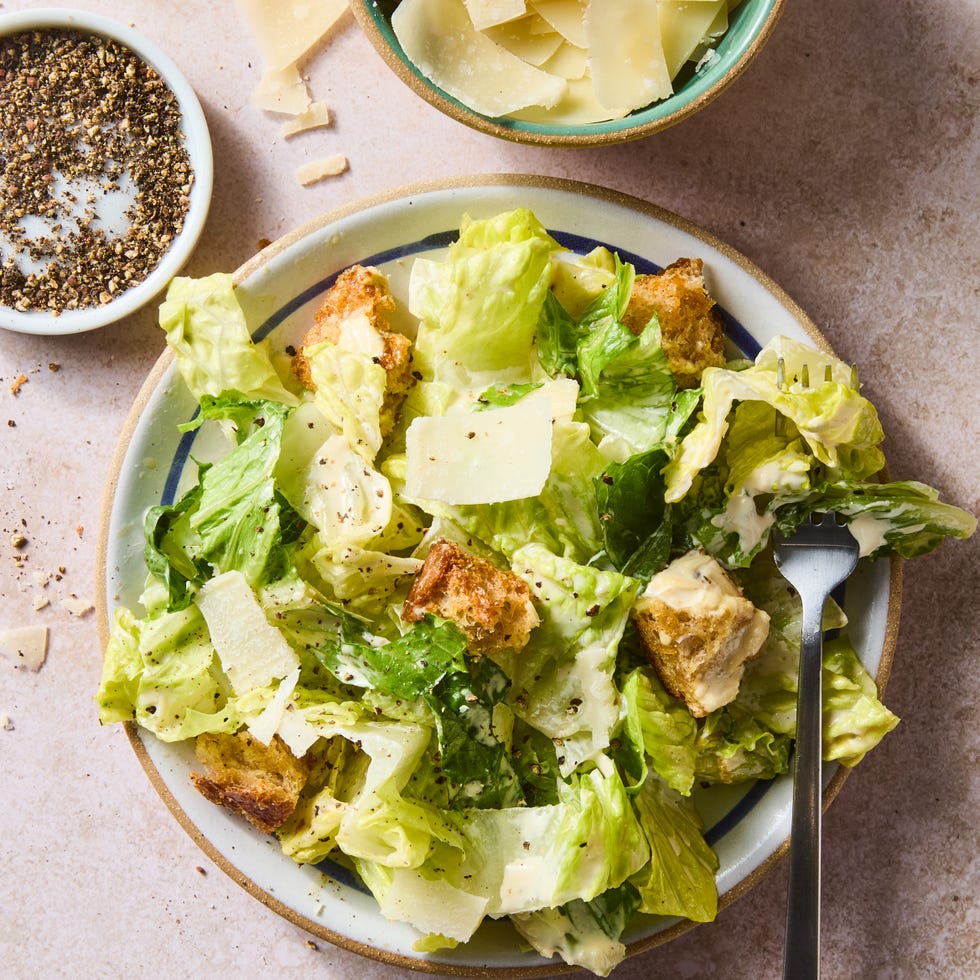 crisp romaine, salty shaved parm, and crunchy homemade sourdough croutons tossed in a creamy, cheesy umami packed dressing