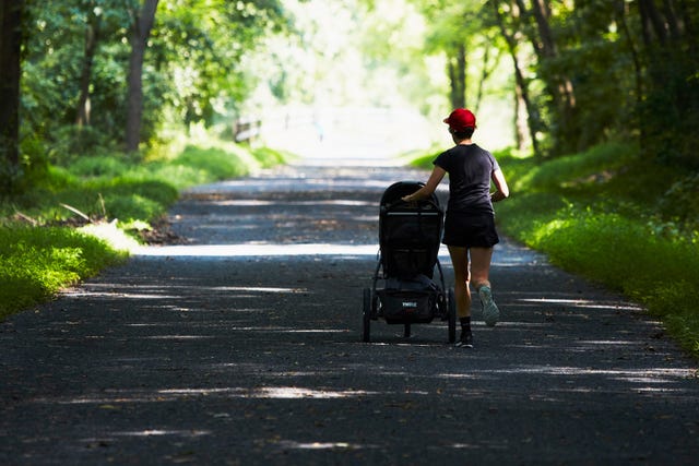 parent running with stroller