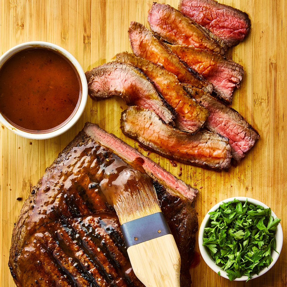 steak sliced and topped with cajun butter and herbs